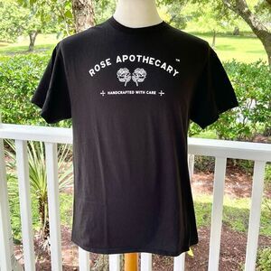 Schitt’s Creek Rose Apothecary T-Shirt. New without tags. Size large. Black.